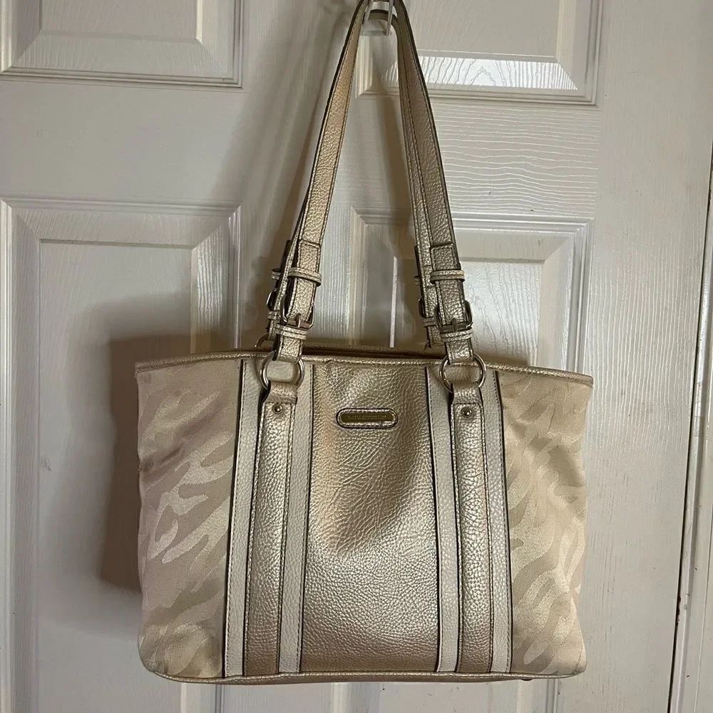 Dana  Buchman beige canvas and faux leather trims and accents shoulder bag.